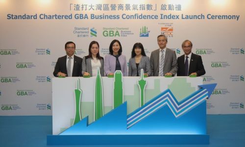 (from left) Standard Chartered's Kelvin Lau, Senior Economist, Greater China; Rose Kay, Head, Greater Bay Area; Mary Huen, Chief Executive Officer, Hong Kong; HKTDC's Margaret Fong, Executive Director; Johnny Wan, Director, Publications & E-Commerce; and Nicholas Kwan, Director of Research, at the launch ceremony of 