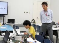 OKI、福岡県で小学生向け「ロボットアーム・プログラミング教室」を実施